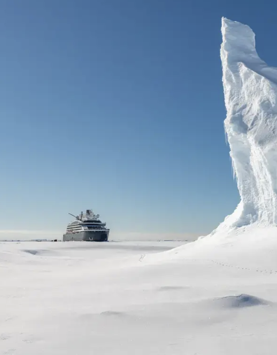 Expedition ship navigating through polar ice